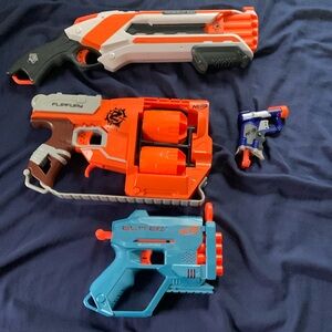 NERF BUNDLE comes with a roughcut shotgun, flipfury blaster, jolt, and quad fire